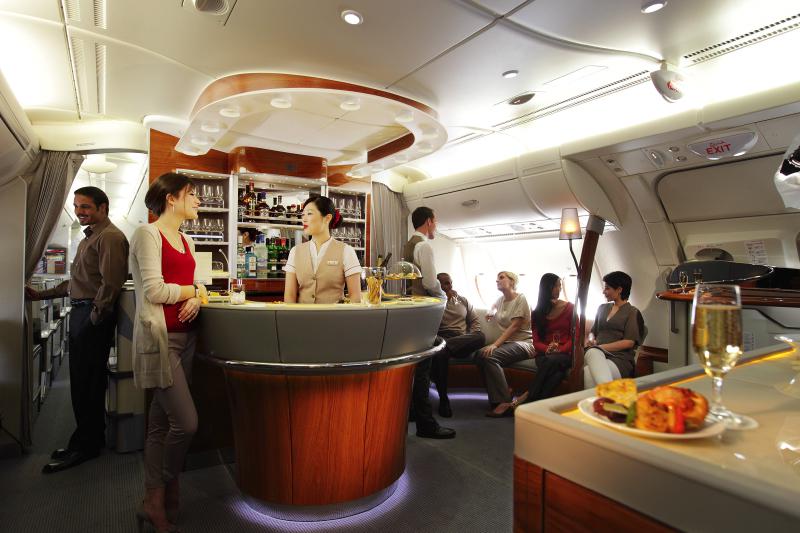 Carriers like Virgin Atlantic, Etihad and Emirates have swanky lounges where passengers can order cocktails 