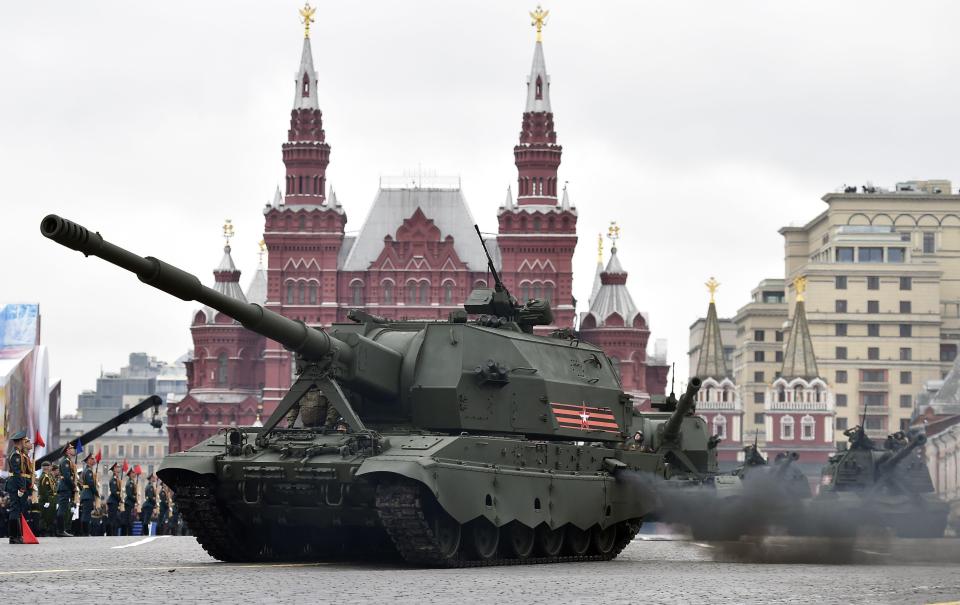  Dozens of tanks also rolled through the square as part of the celebrations