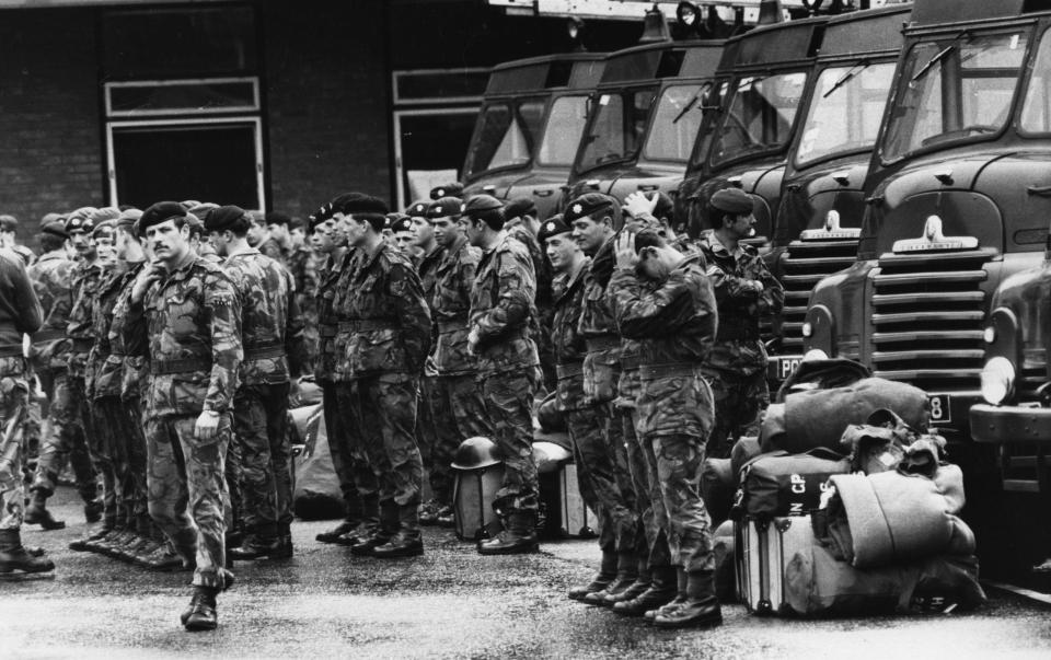  Soldiers stand to attention at London's Chelsea Barracks as they prepare to take over the role of public sector workers, including firemen, during the strikes in 1977