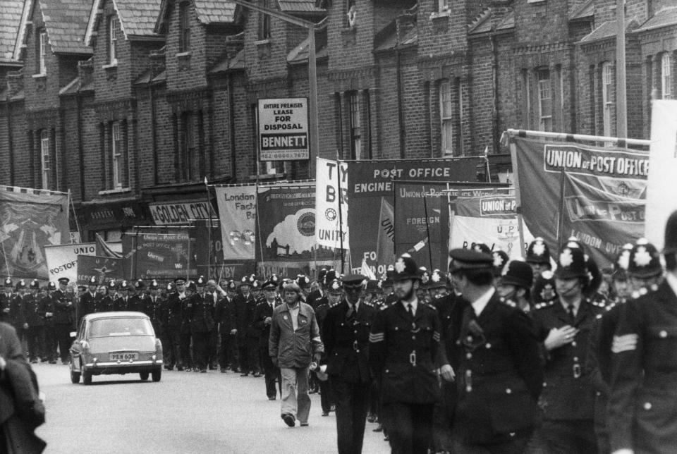  Protesting postal workers march through the streets of London in support of industrial action at Grunwick photo-processing laboratory in Willesden