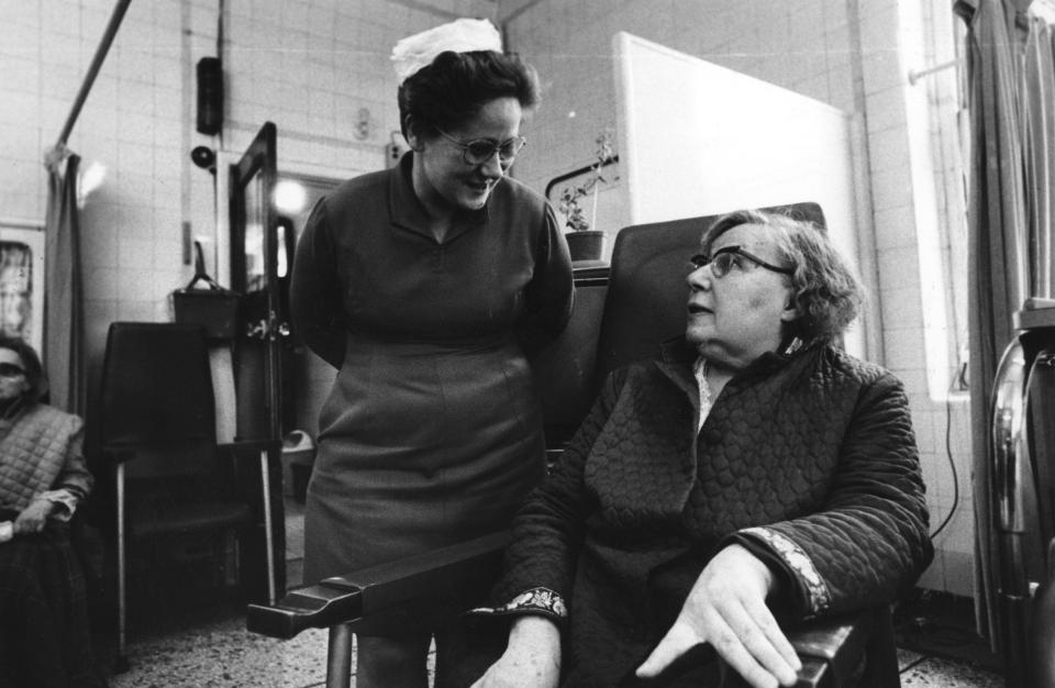  A concerned patient discusses the impending closure of the Elizabeth Garrett Anderson hospital with a nurse in 1976