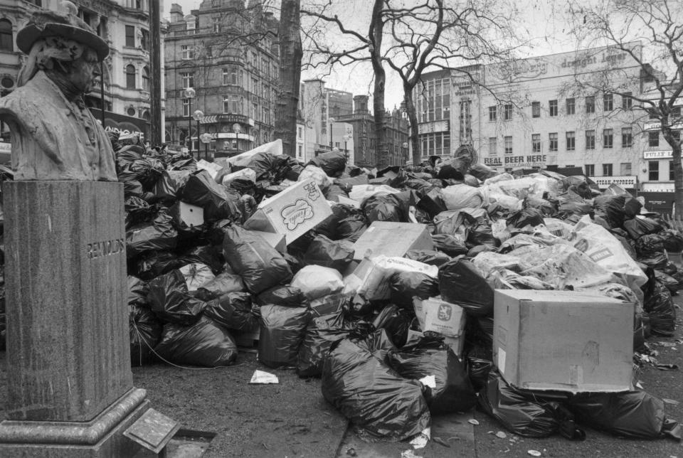  Mounds of rubbish bags are piled high in London's iconic Leicester Square in 1979 as dustmen strike for increased pay