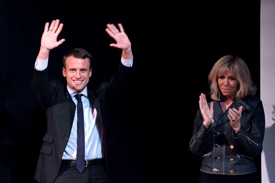  French President Emmanuel Macron celebrates victory with his wife despite election was the subject of hacked emails