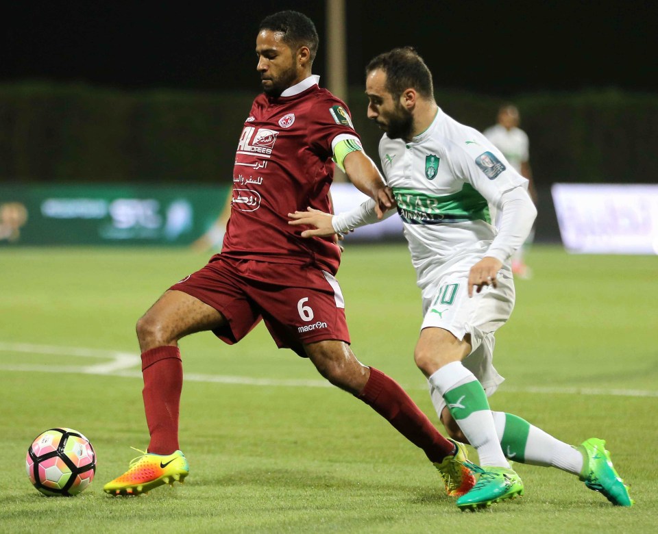  Al-Ahli star Ioannis Fetfatzidis closes on Al-Faisaly player Omar Abdulaziz but his team has suddenly been merged with two city rivals