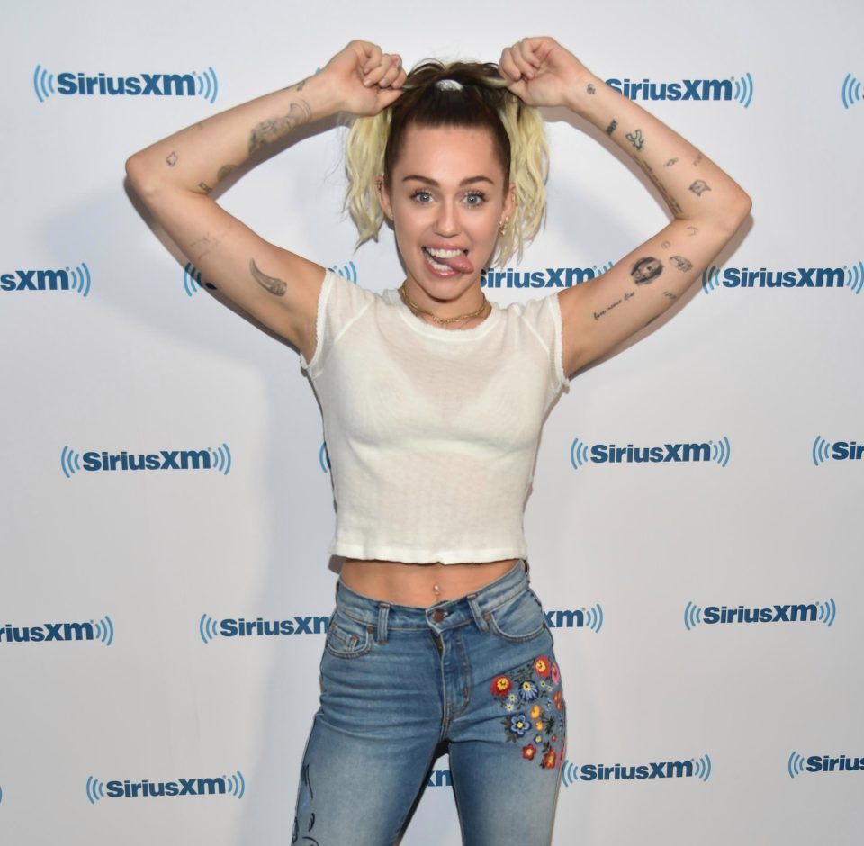  Miley Cyrus mixes her bad girl and super-clean do-gooder look while at The SiriusXM Studios in LA