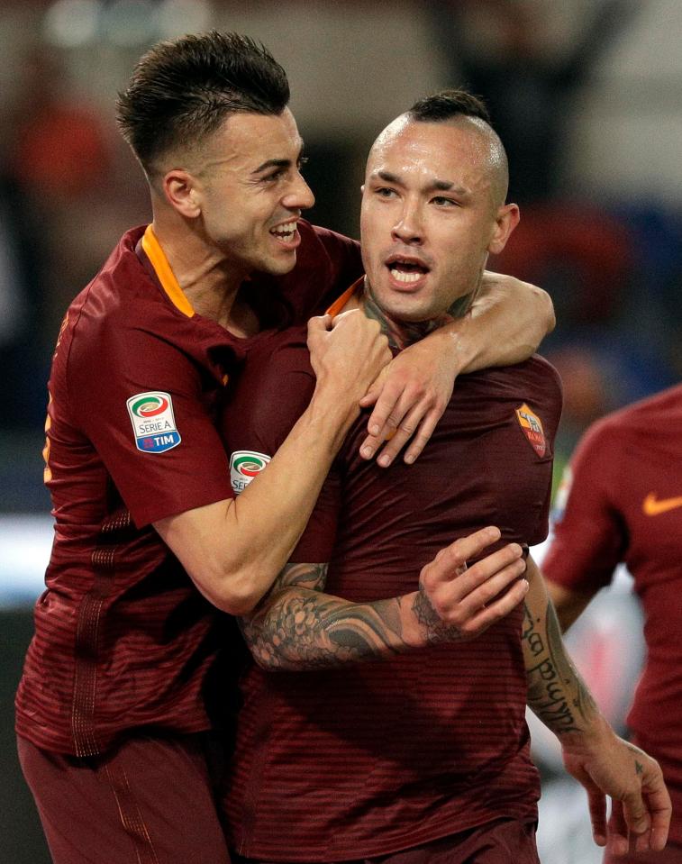  The Belgian international celebrates after his strike as Roma closed the gap on Juventus at the top of the table