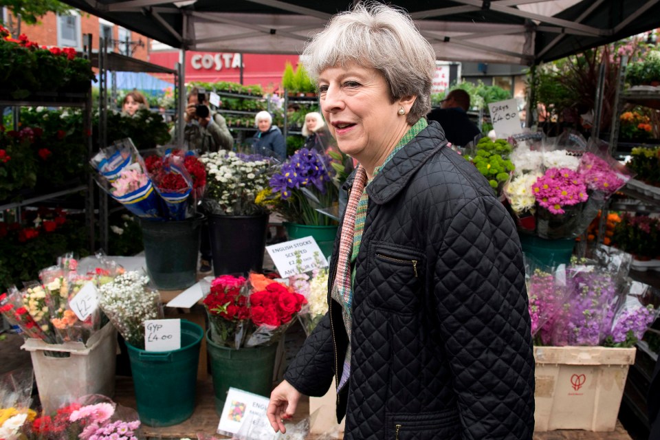 Theresa May, who is pictured on the campaign trail in Oxford today, is set for a large majority according to the polls