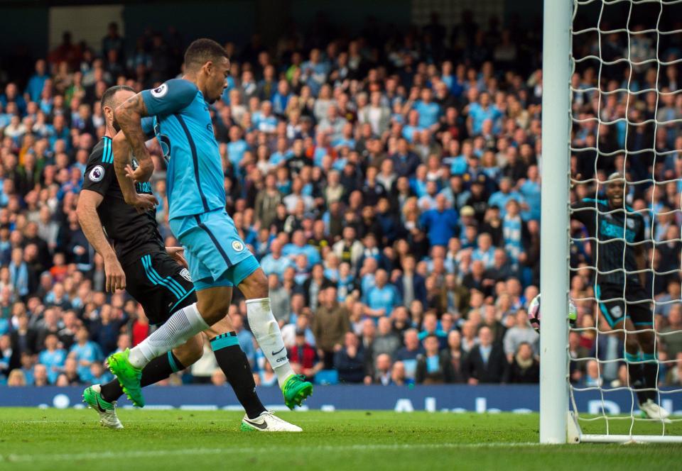  Gabriel Jesus pokes home the opening goal from close range