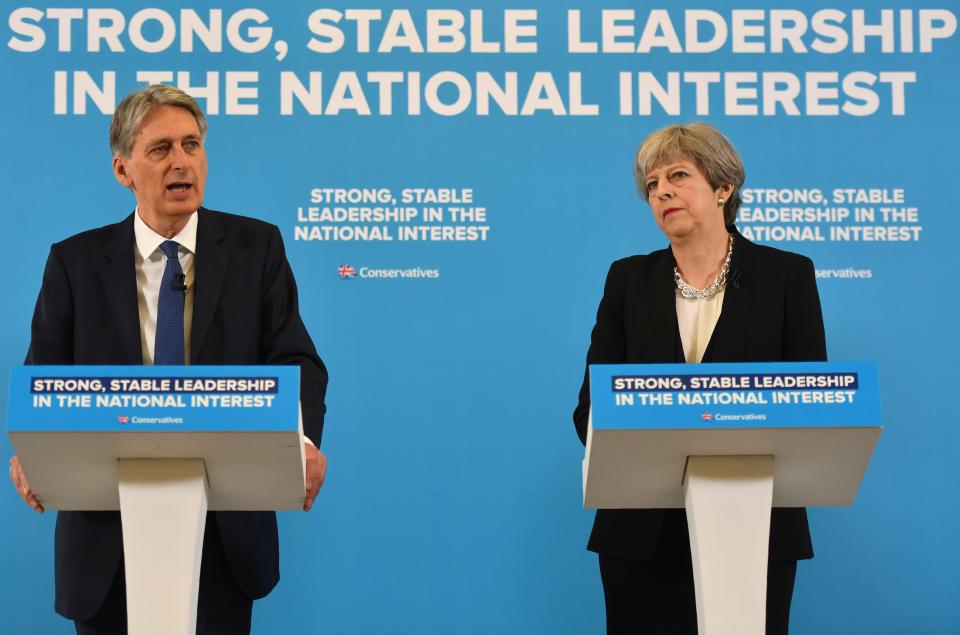  Theresa May refused to say whether Philip Hammond will stay on as Chancellor if the Tories win the election