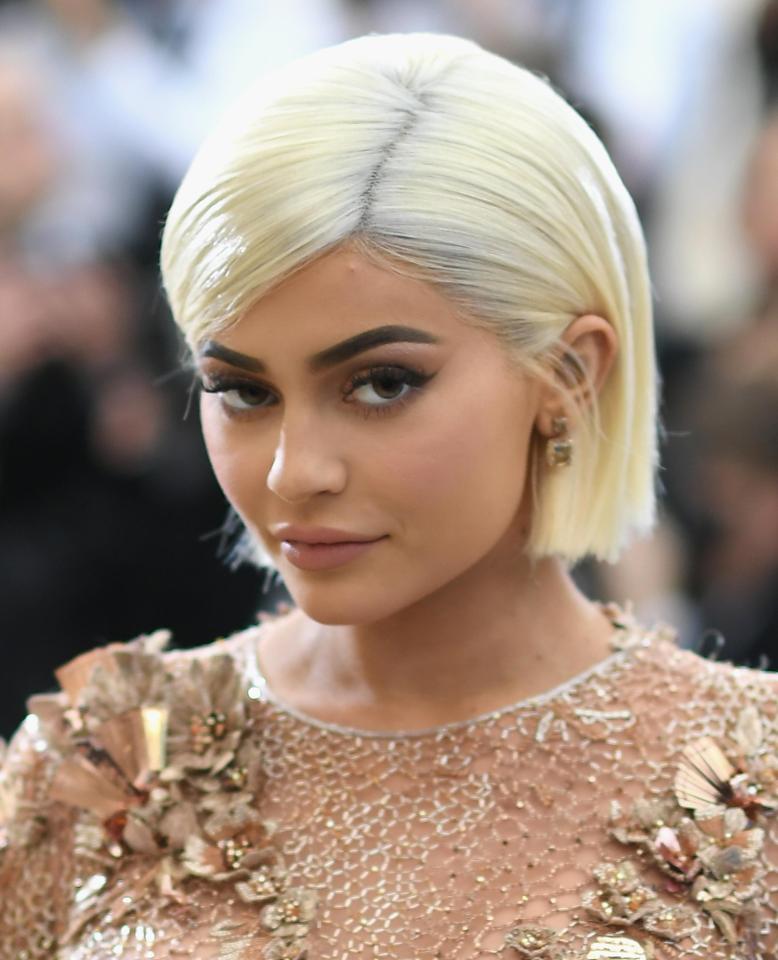  The teen rocked a bold look to the Met Gala earlier this year, complete with a peroxide blonde bob and plumped-up lips