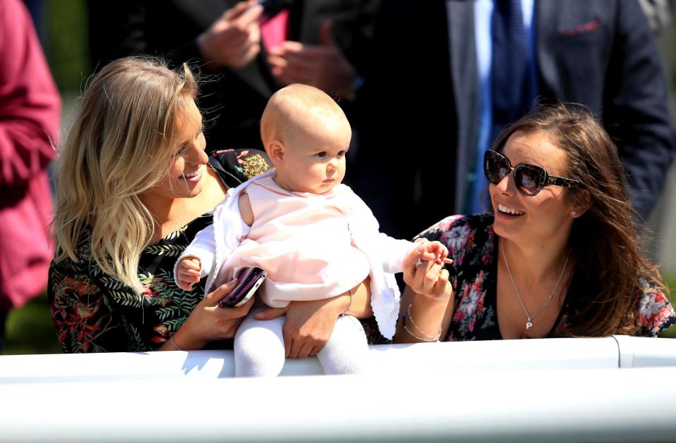  The festival attracted people of all ages - with one youngster pictured taking in all the racing action