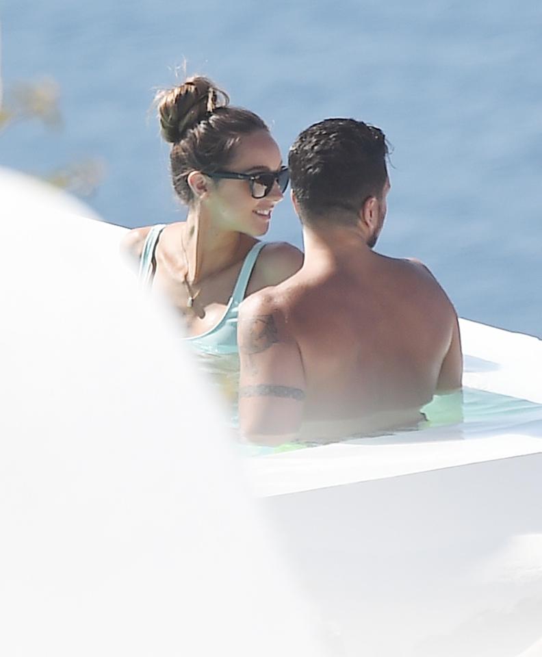  The sun kissed duo have been pictured soaking up the sun in the pool