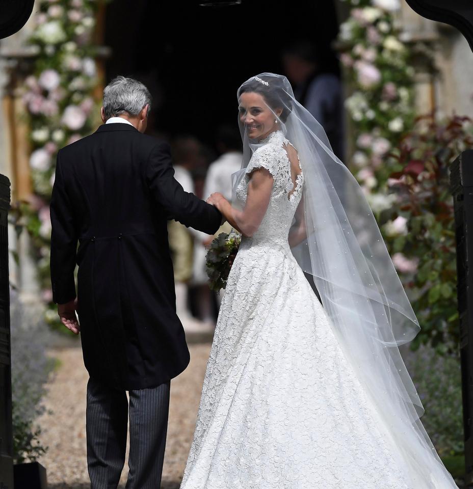  Pippa Middleton stunned in white lace on her big day