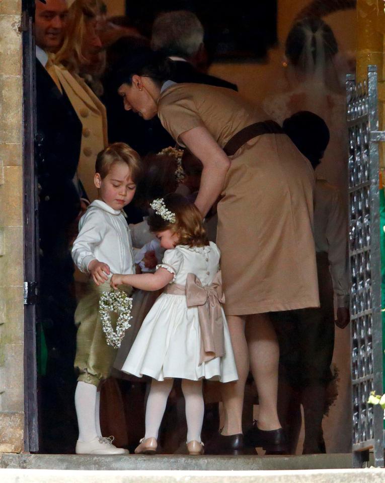  Prince George and Princess Charlotte being looked after by their nanny in the church