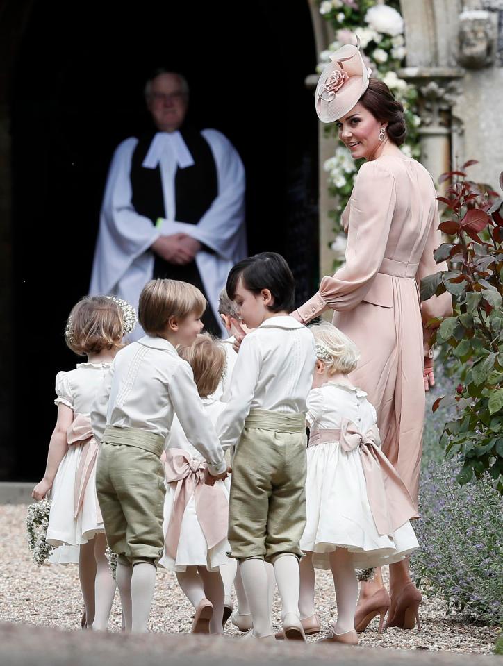  Kate was tasked with keeping the young page boys and flower girls in check