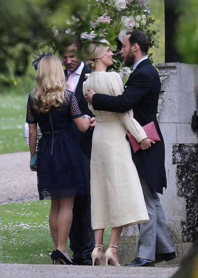  TV personality Donna Air embraces her boyfriend James Middleton outside church