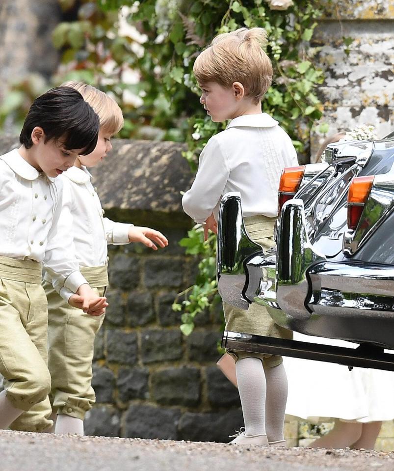  Prince George pictured with the other page boys before the ceremony