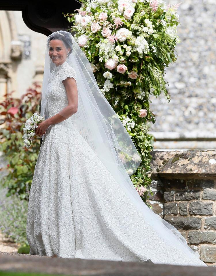  Pippa wore a bespoke Giles Deacon lace gown that probably cost more than £50,000