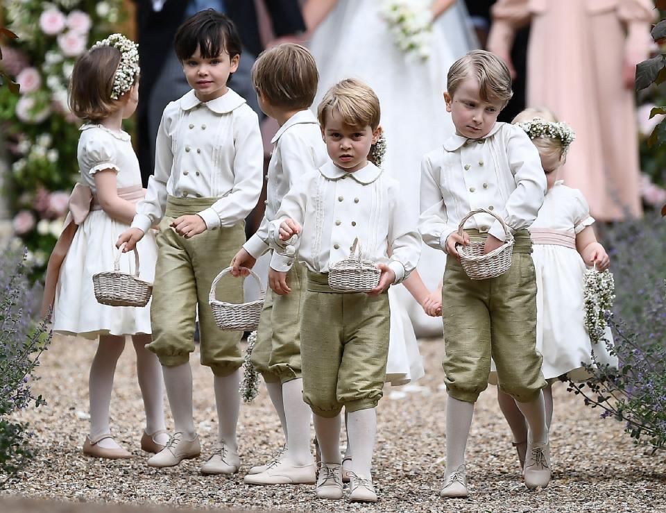  Prince George looked to be taking his page boy duties seriously as he led the group out of the church