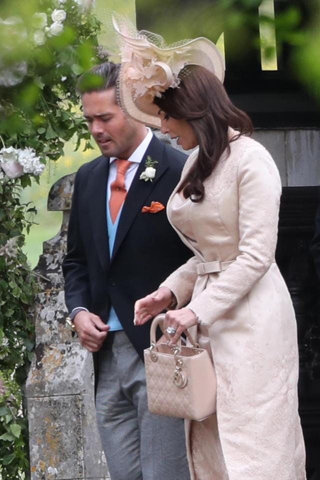  Reality TV star Spencer Matthews walks out of the church with friend while girlfriend Vogue Williams is at home