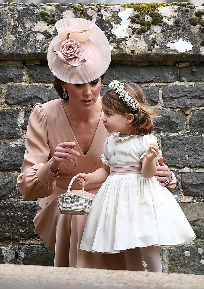  Princess Charlotte compliments Kate's wedding outfit thanks to her nude pink sash