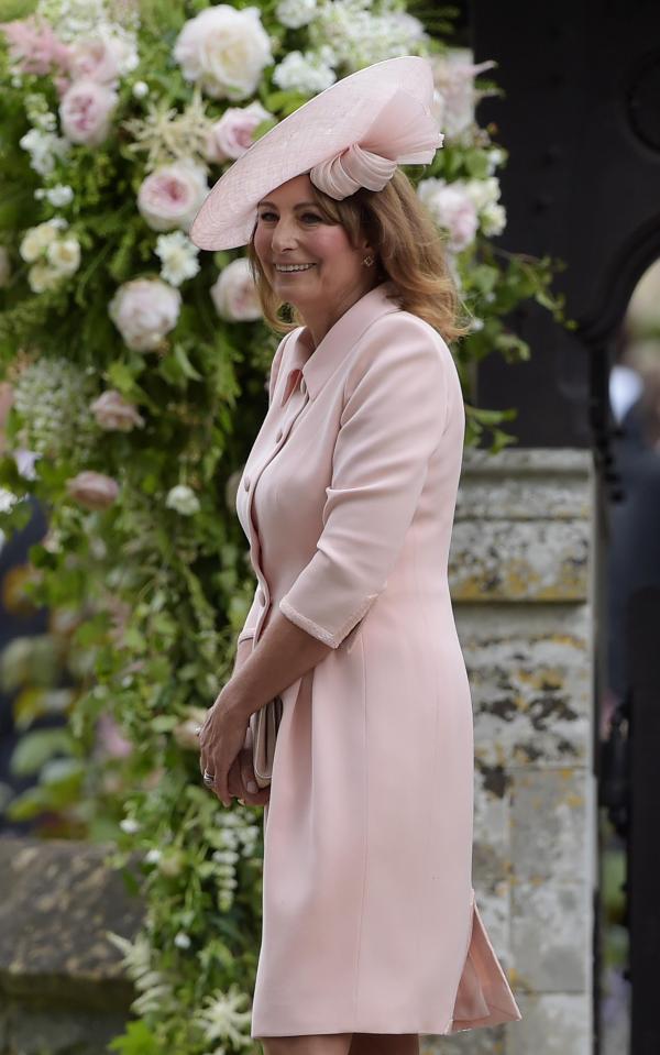  Kate Middleton's proud mum Carole pictured at Pippa's wedding in pink outfit