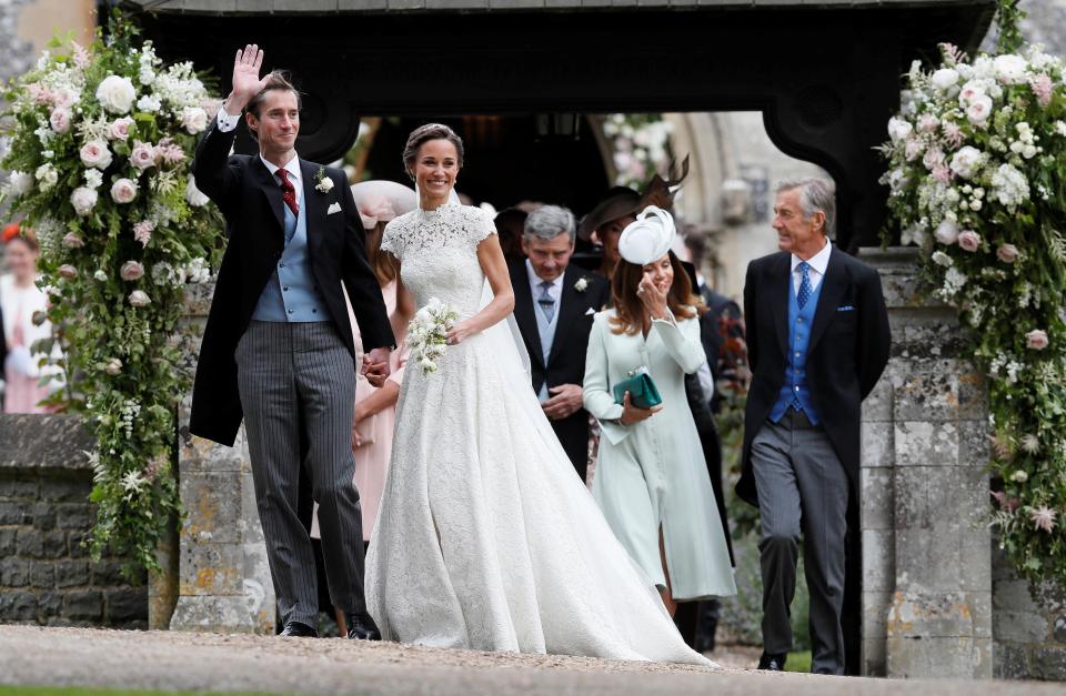  Newlyweds James and Pippa with their fathers while Jane Matthews wipes away tears of joy