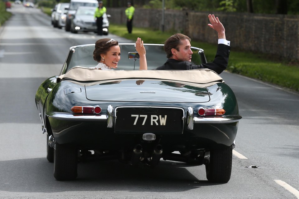 Pippa and James waved at well-wishers as they sped off in a Jaguar V to Englefield House, a 16th century manor in breath-taking grounds