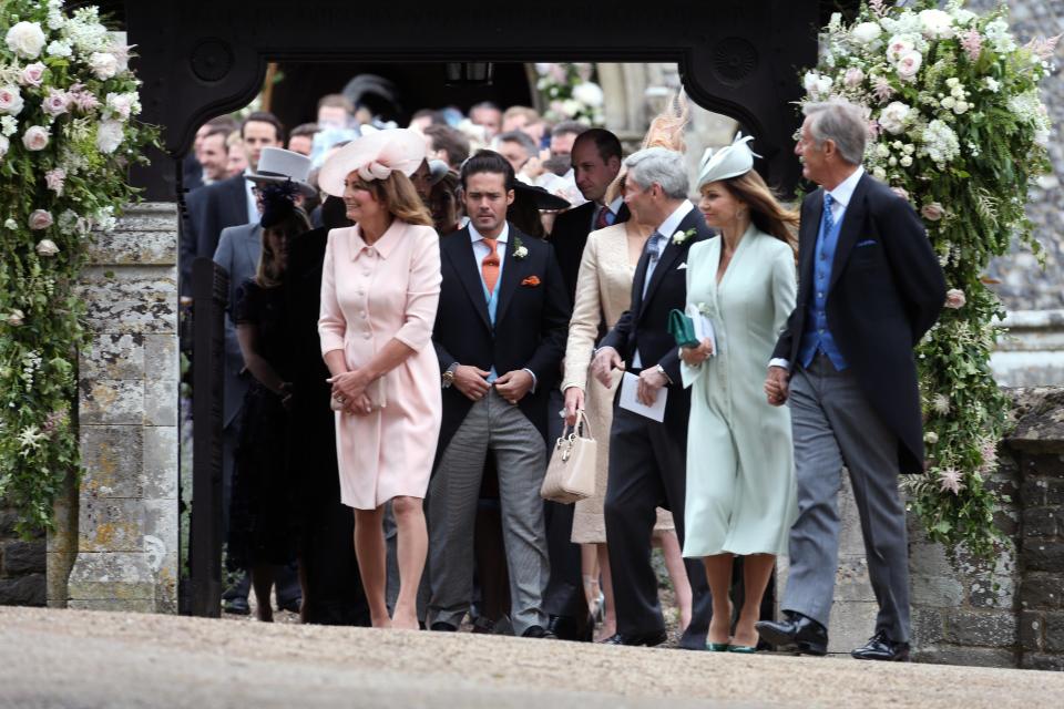  Stylish mums Carole Middleton and Jane Matthews leave the church after a star-studded bash