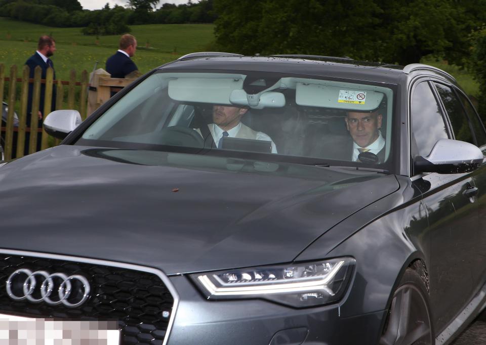  Harry takes the wheel of an Audi RS6 to pick up his girlfriend Meghan Markle