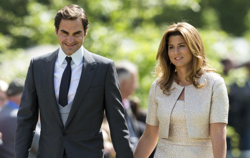 Seven-time Wimbledon champion Roger Federer, pictured with wife Mirka, is said to have played ping-pong with guests at the lavish reception