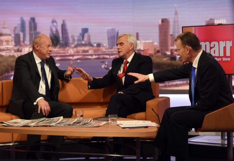 Host Andrew Marr tries to wade in the furious argument between the two MPs