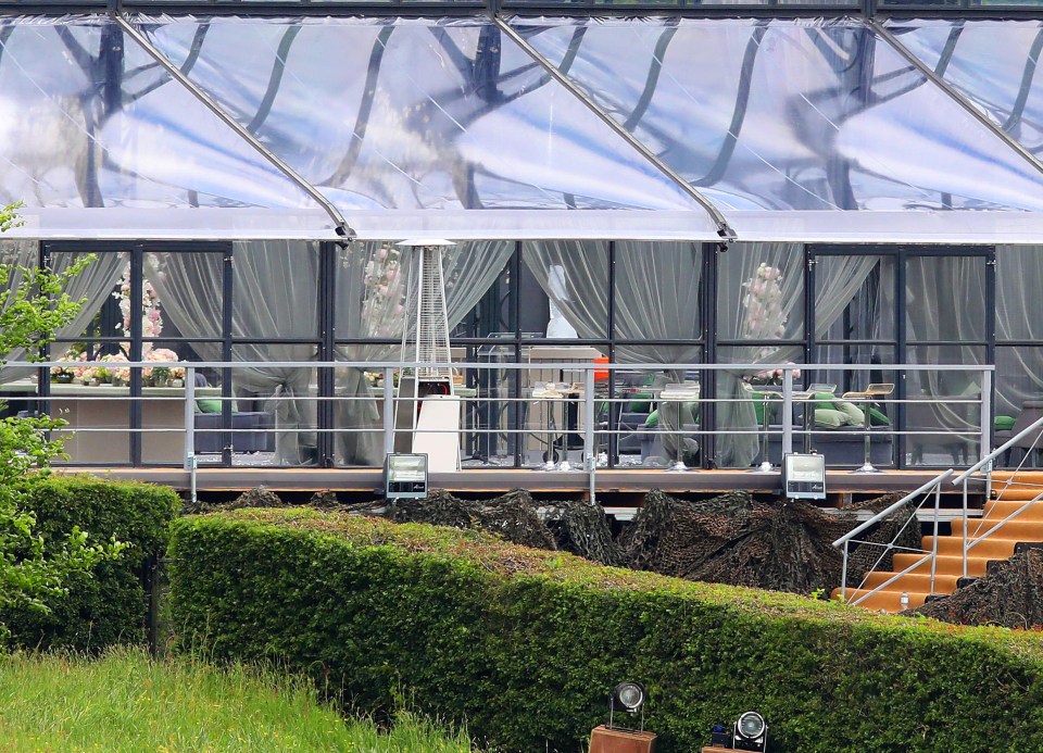 As scattered showers were forecast for the big day, the bride spared no expense to keep guests dry