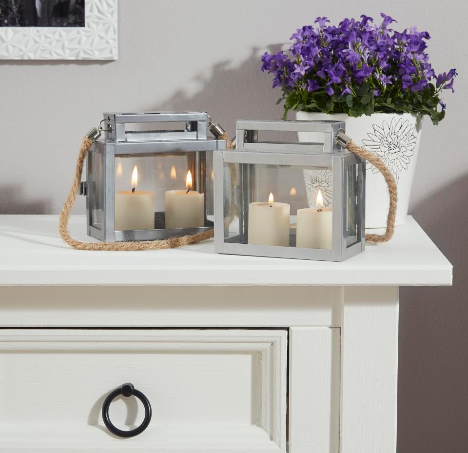  Candle holders and faux-flowers are also featured in the £1 collection