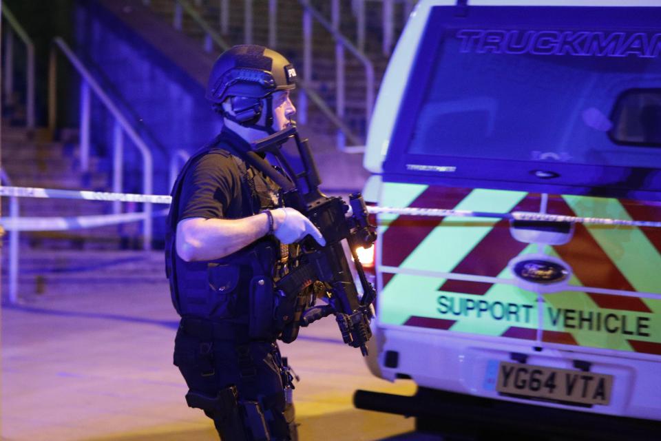  Witnesses reported thousands of screaming fans ran from the concert hall as armed police were called in