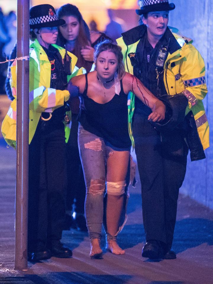 Injured victims were pictured outside the venue, with 59 injured and at least 22 dead