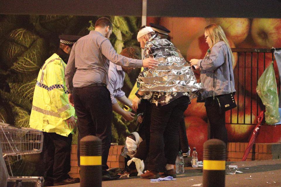  Injured people are treated after the deadly Manchester Arena blast