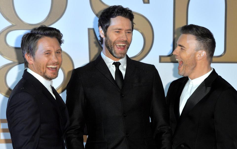  Mark is still with Take That as a three-piece