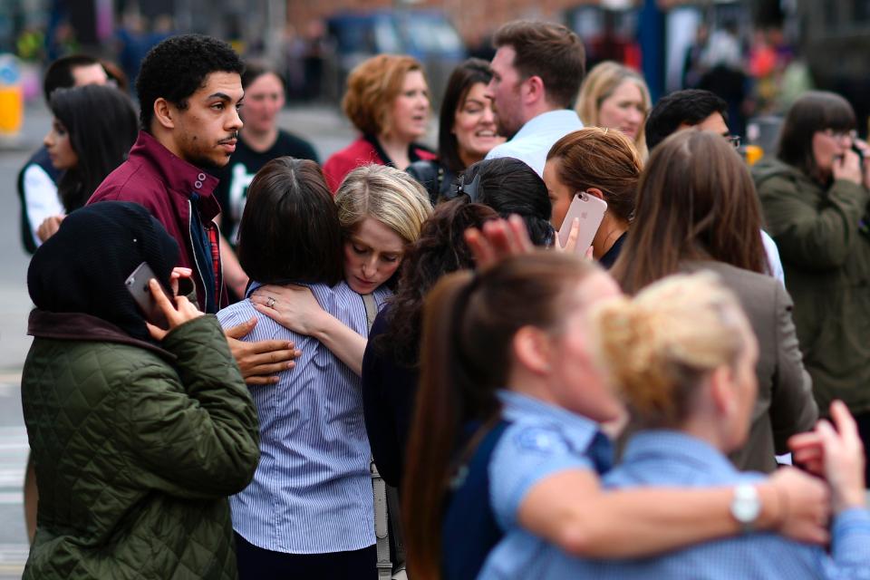 Terrified members of the public comforted each other after the scare today