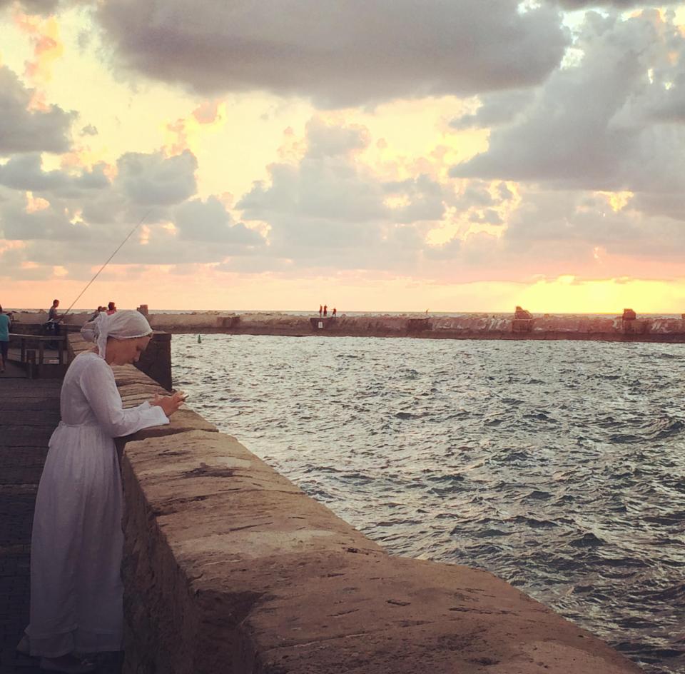  Beauty spot . . . local relaxes on the boardwalk as our writer soaks up the sites in Tel Aviv