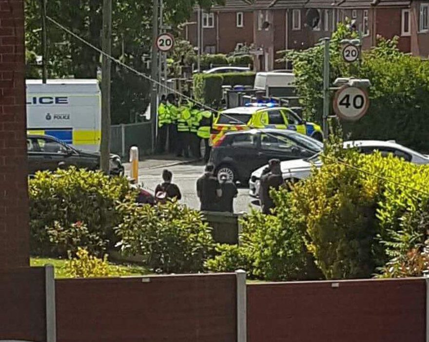 Police with face masks were spotted outside a supermarket making the arrest