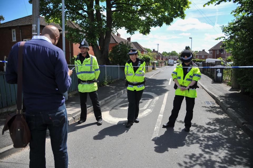 A heavy police presence at the scene near Chorlton