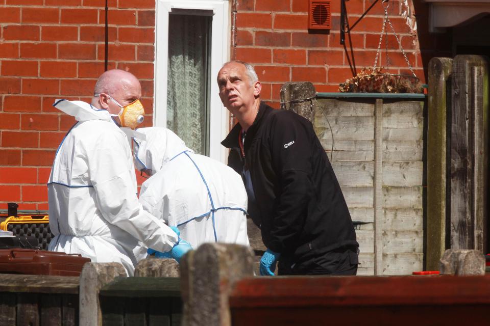 Forensic officers outside of a Chorlton home