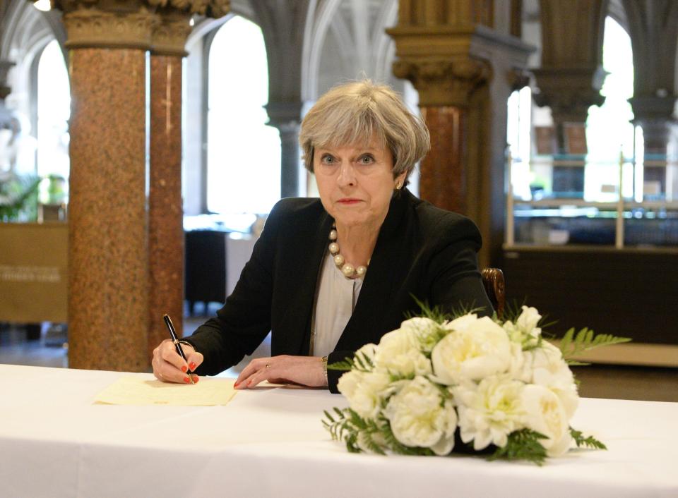  Theresa May wrote a message for the book of condolences at Manchester Town Hall this afternoon