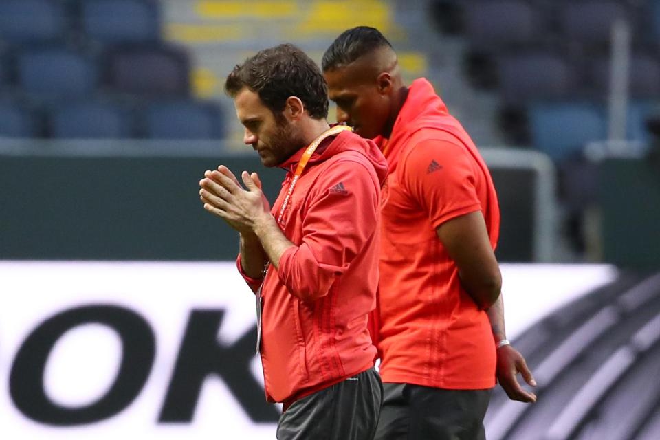  Manchester United's Juan Mata and Antonio Valencia on the pitch ahead of the Europa League final