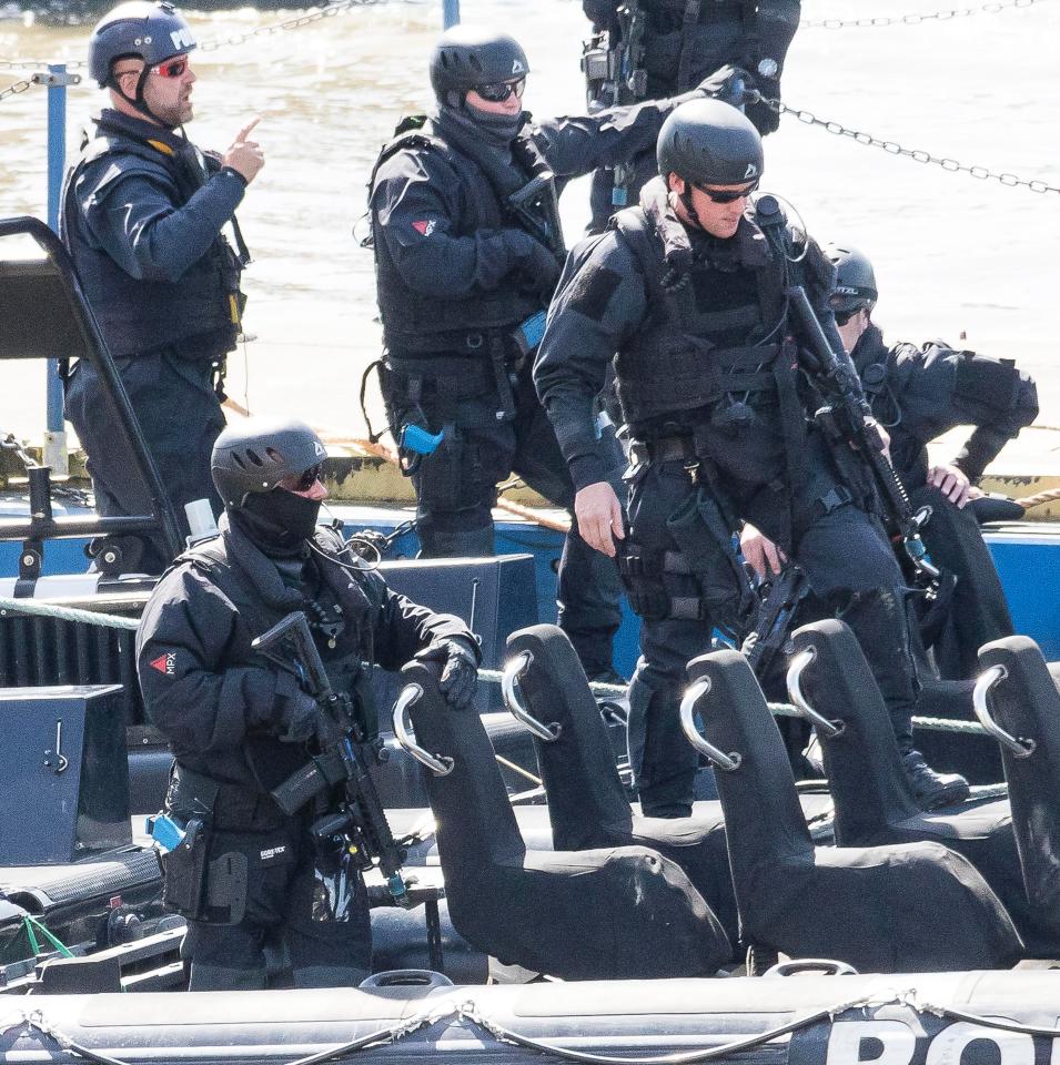  Marine Police officers pictured leaving their base on the River Thames this morning