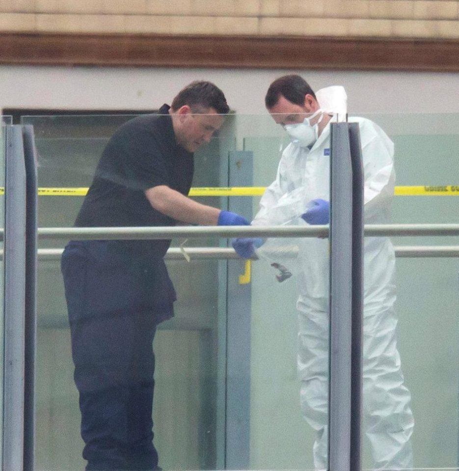  Forensics investigators work outside the Manchester Arena two days after the attack