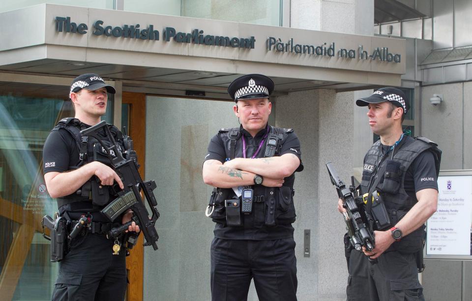  Armed Police outside The Scottish Parliament in Edinburgh as Holyrood and other potential target areas have a heightened Police Scotland presence