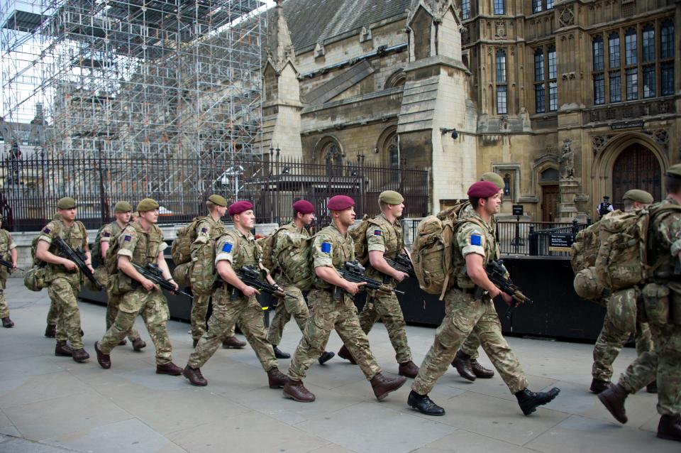  A number of soldiers arrive at Westminster to join armed guards patrolling the streets of the capital