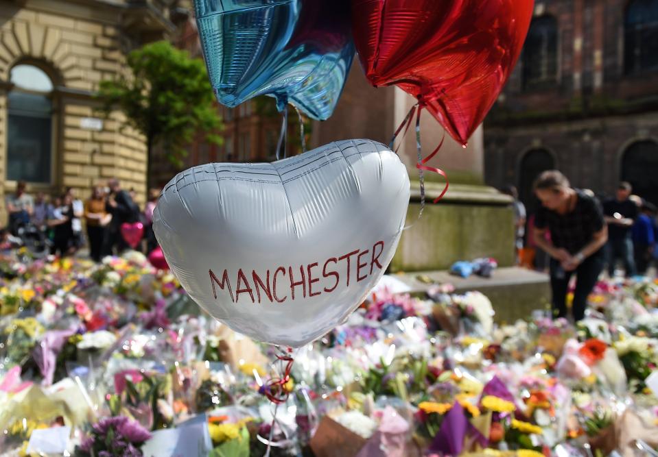  Tributes in St Ann's Square in Manchester today as hundreds have flocked to pay their respects to the victims